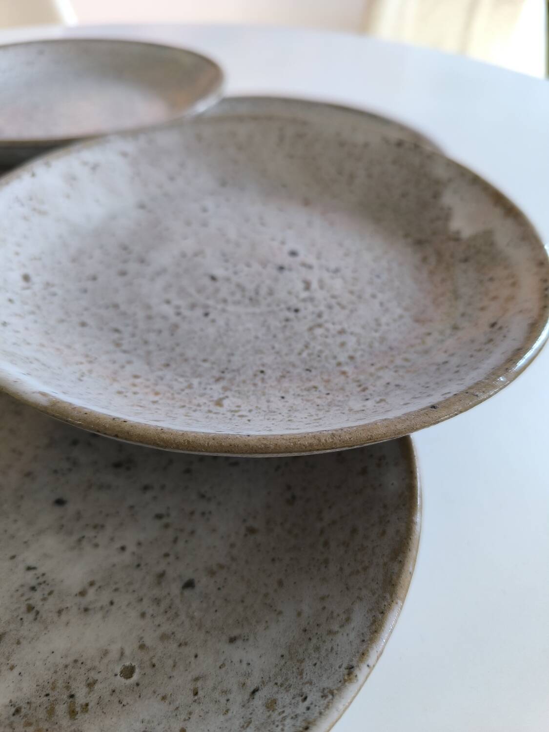 Set of six glazed stoneware plates