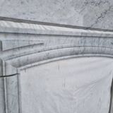 White Carrara marble fireplace