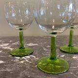 4 green stemmed glasses