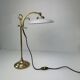 Vintage desk lamp that raises and lowers.