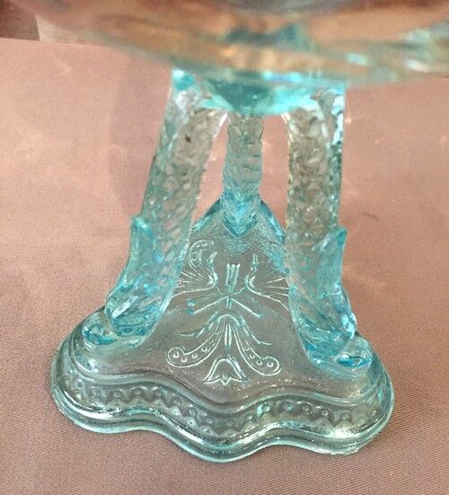 Cup on crystal stand and portious glass