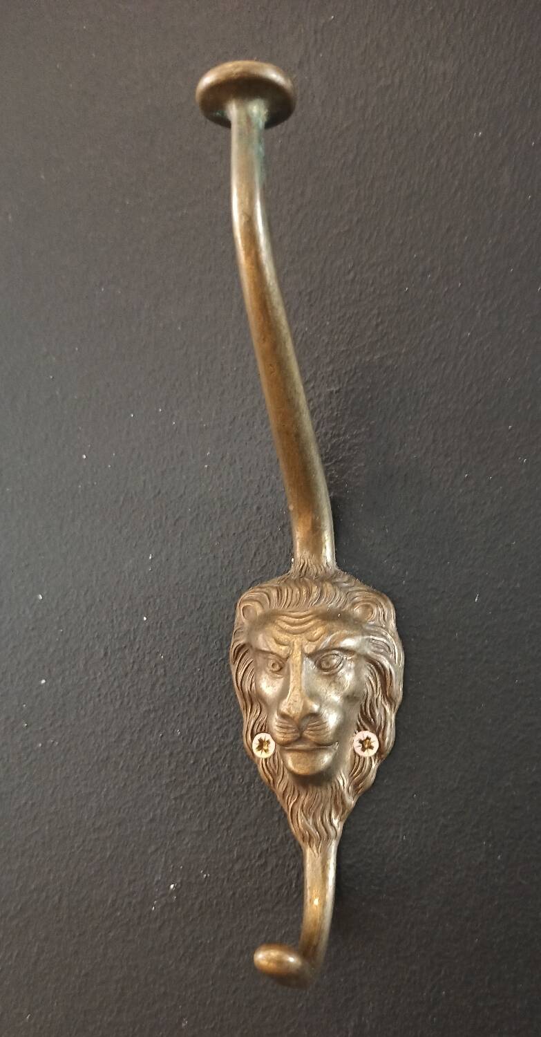 Set of 5 antique "Lion Head" coat hooks.