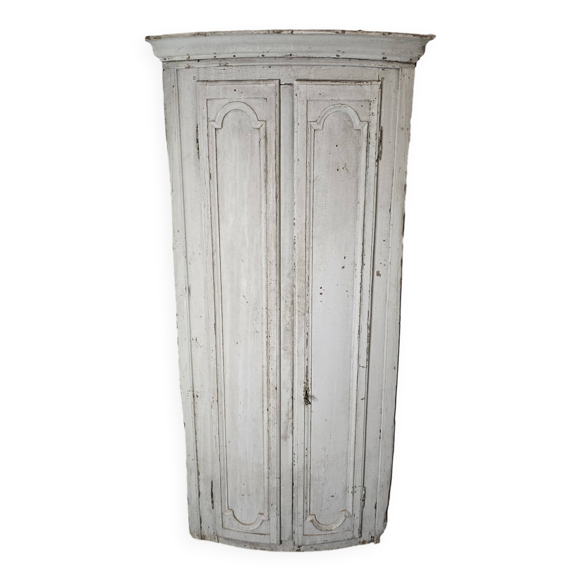19th century curved corner cupboard in patinated oak