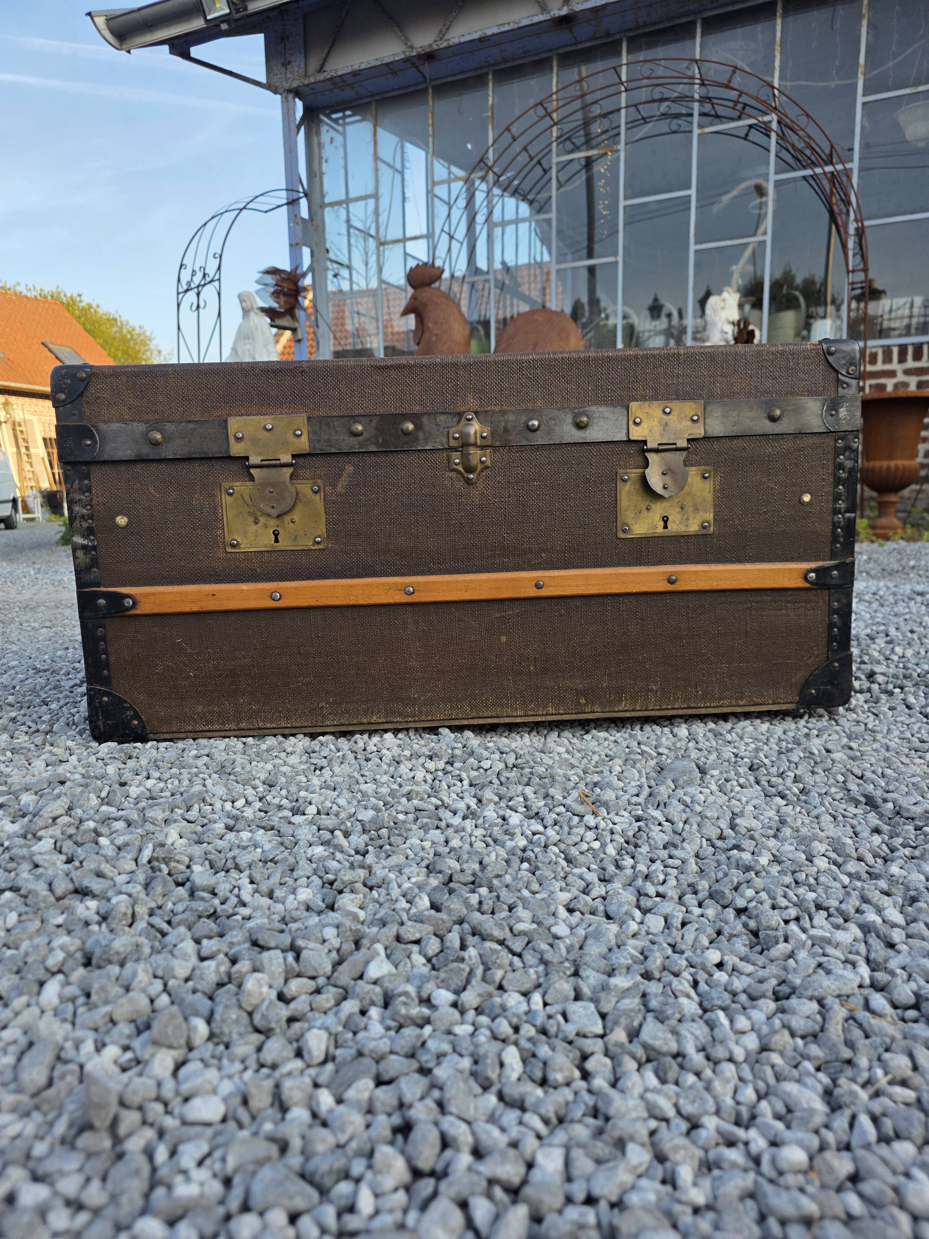 Old travel trunk in oilcloth