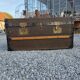 Old travel trunk in oilcloth