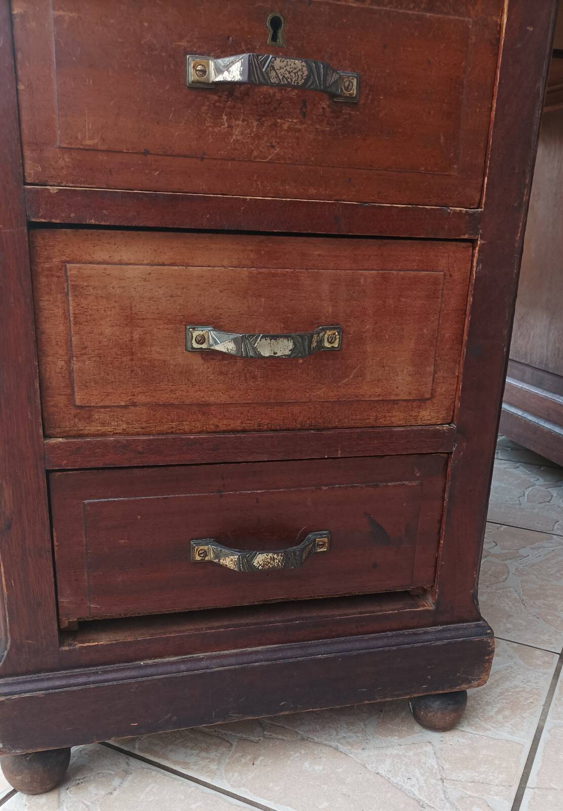Vintage double-sided mahogany desk with 18 drawers.