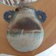Oval/round pottery on base signed