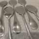 6 individual silver-plated metal sauce spoons with hammered baguette handles