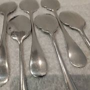 6 individual silver-plated metal sauce spoons with hammered baguette handles