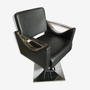 Skai hairdressing chair with chrome metal armrests and black skai imitation leather