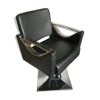 Skai hairdressing chair with chrome metal armrests and black skai imitation leather