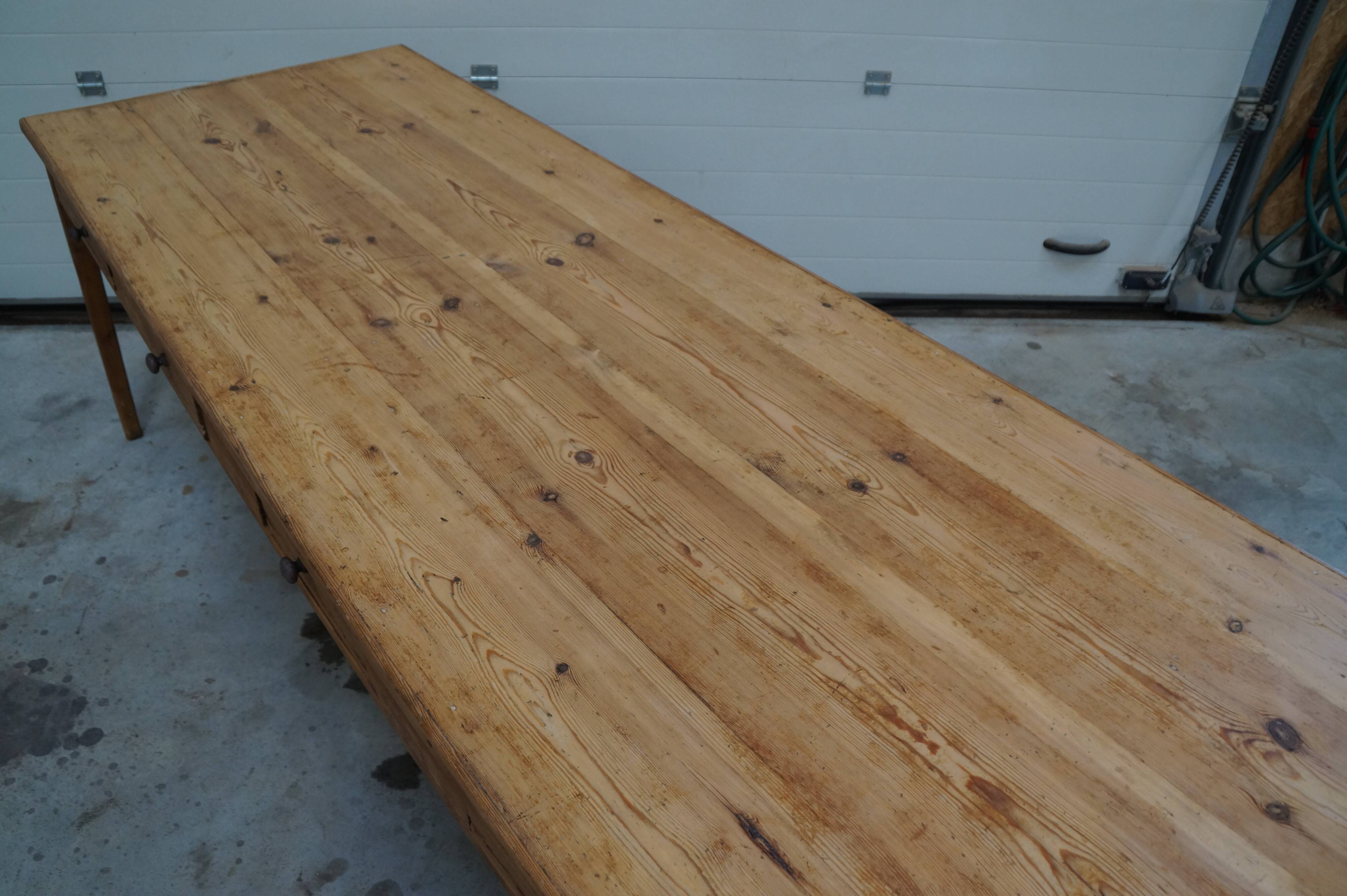 Old canteen in pine table