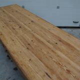 Old canteen in pine table