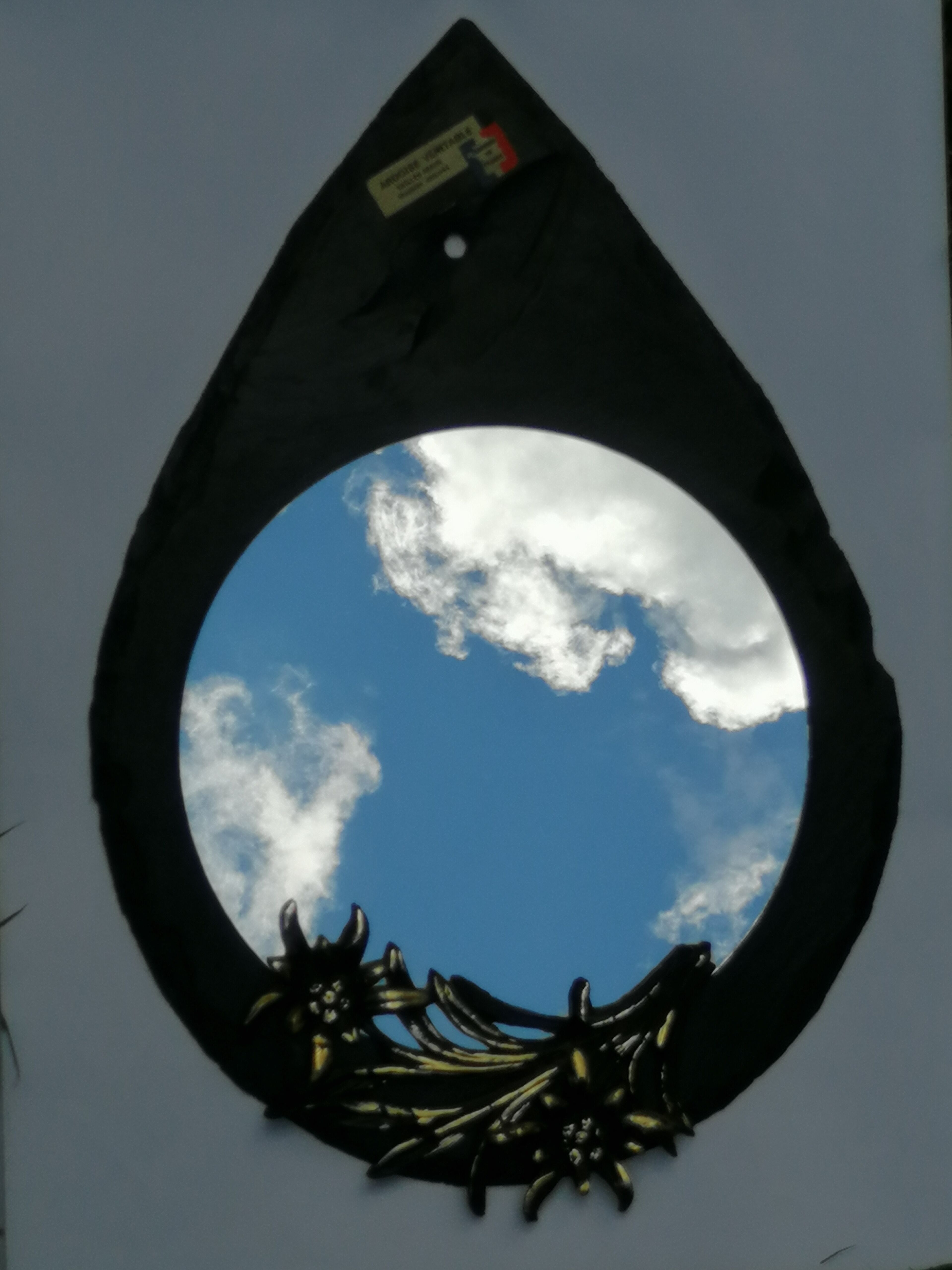 Mirror on hand-cut slate