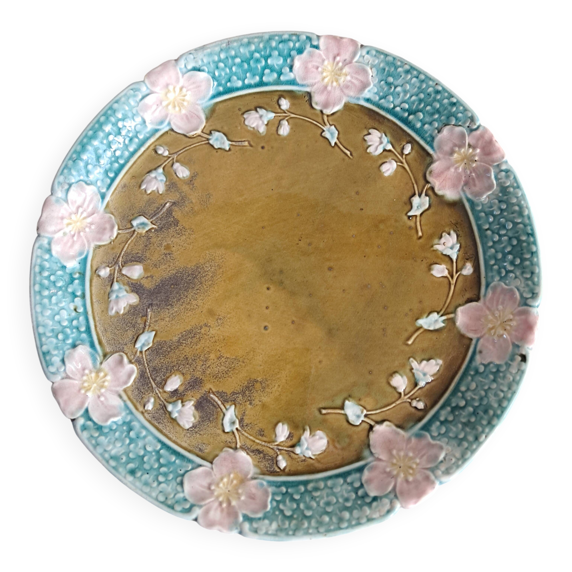 Vintage barbotine plate by Gustave de Bruyn.