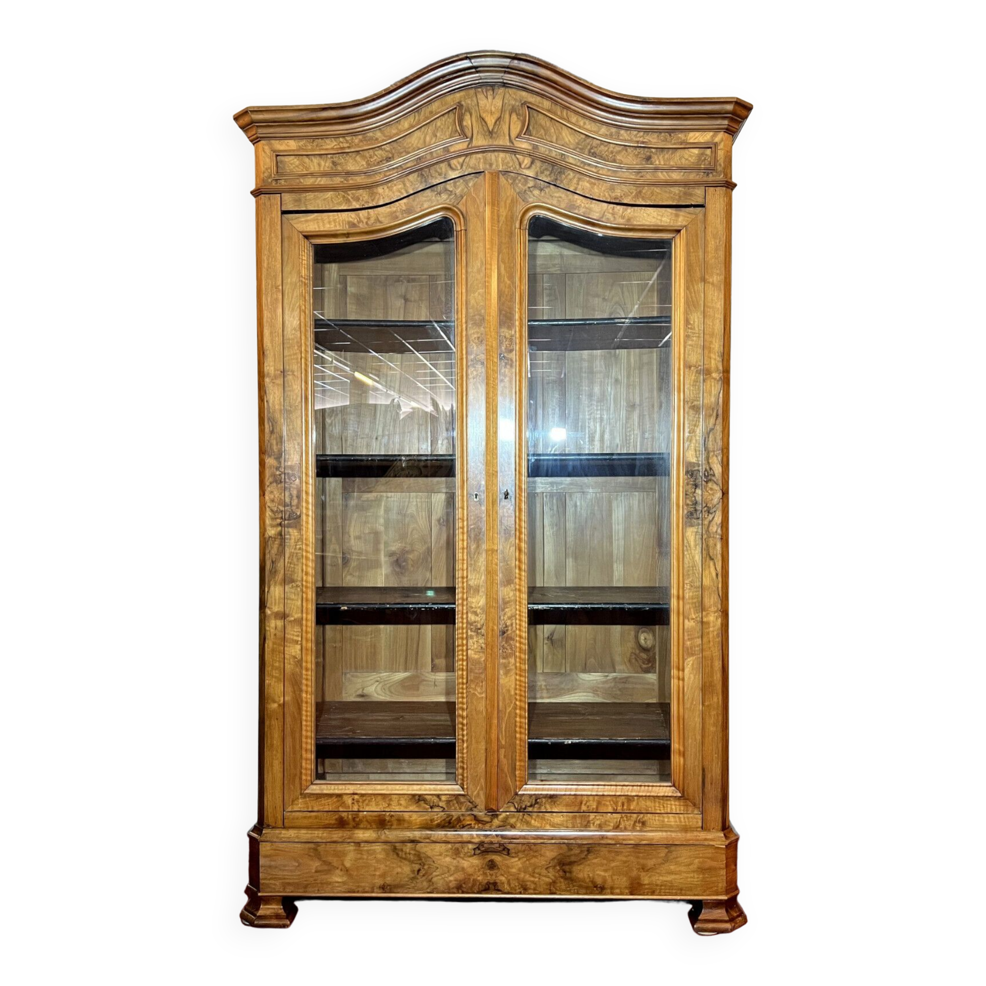 Library with gendarme's hat Louis Philippe era in blond walnut around 1830