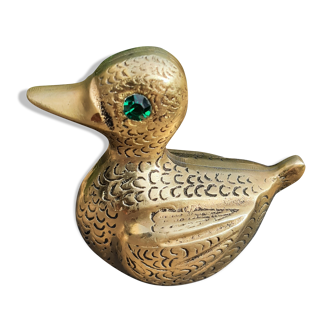 Brass duck, emerald eyes