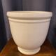 Cache pot en ceramique couleur gres clair forme ronde