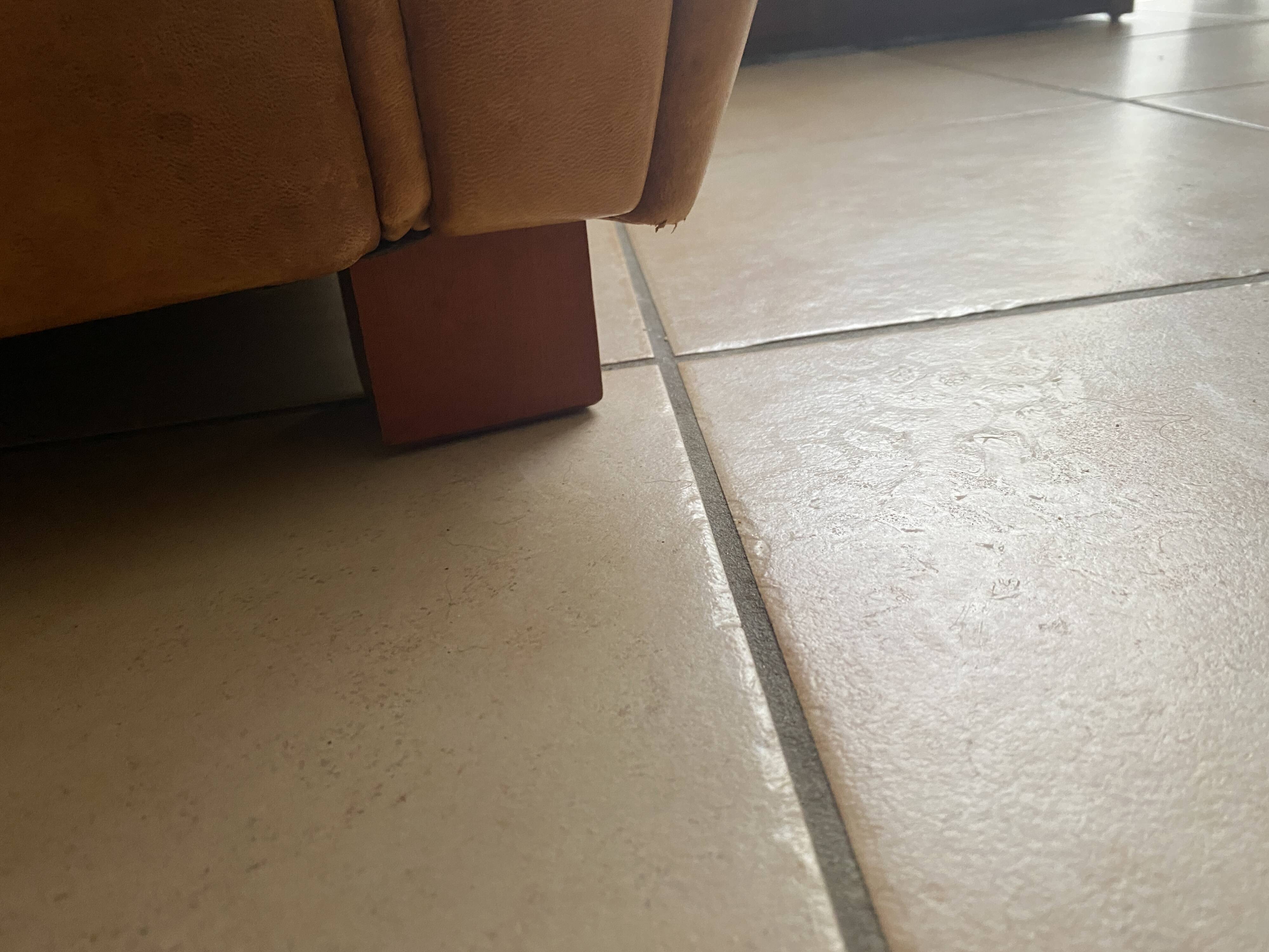 Brown leather club armchairs with an antique finish.