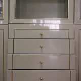 Showcases in lacquered wood, glass and brass  1970s, set of 4