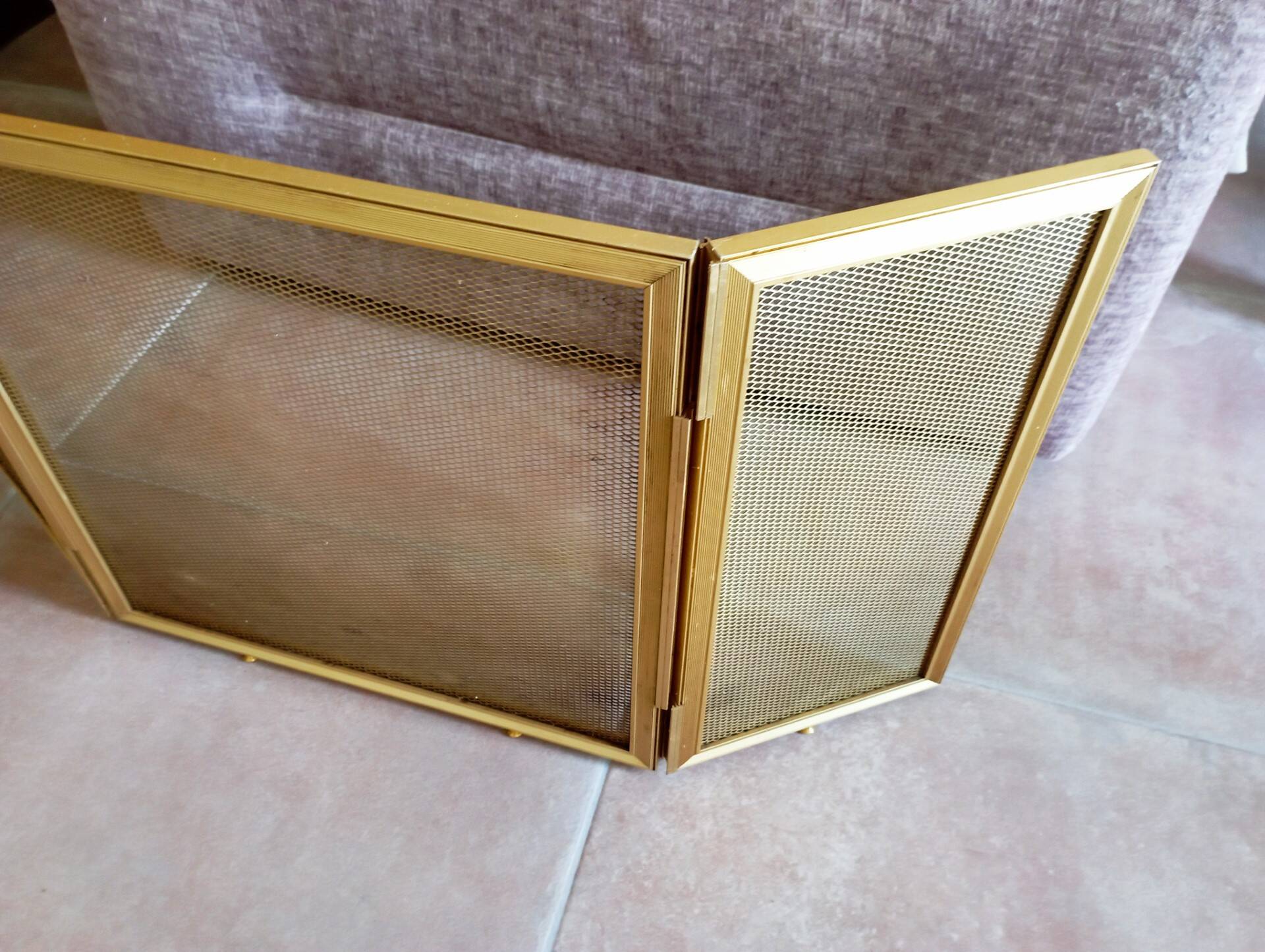 Gold metal fire screen