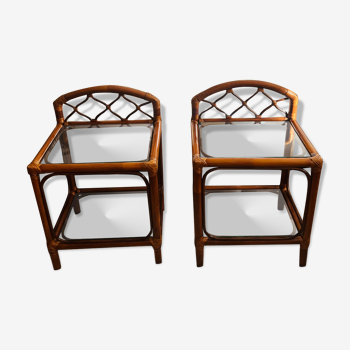 Two rattan and glass bedside tables