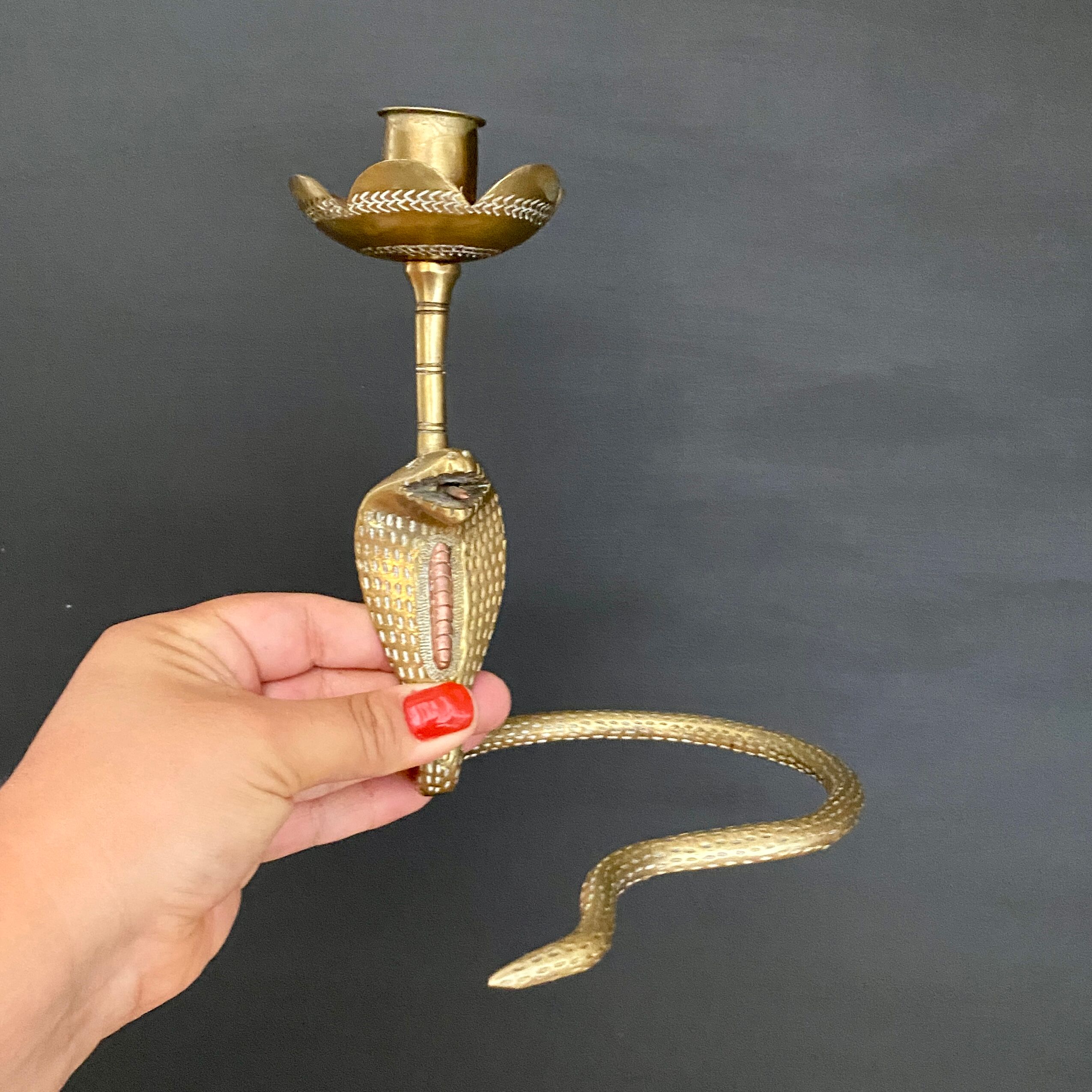 Brass candle holder in the shape of cobra -snake
