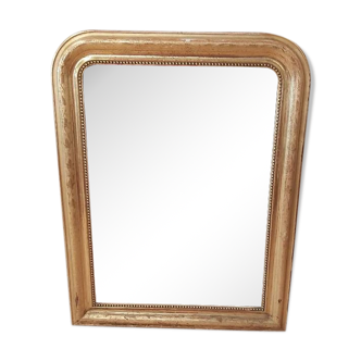 Golden Louis Philippe mirror with golden leafy