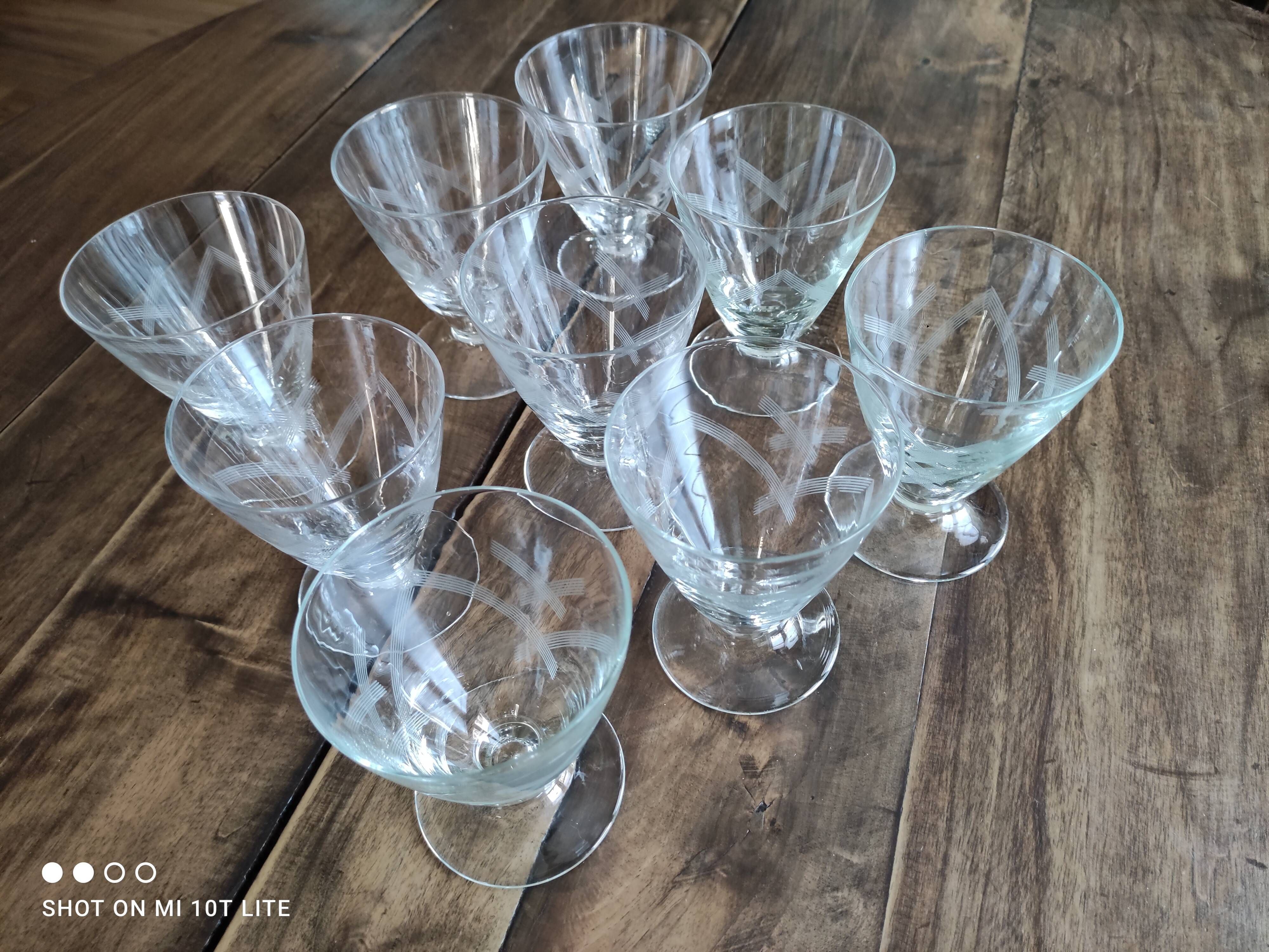 Set of 9 conical glasses on pedestal in antique chiseled glass crosses