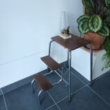 Old retractable wooden stepladder