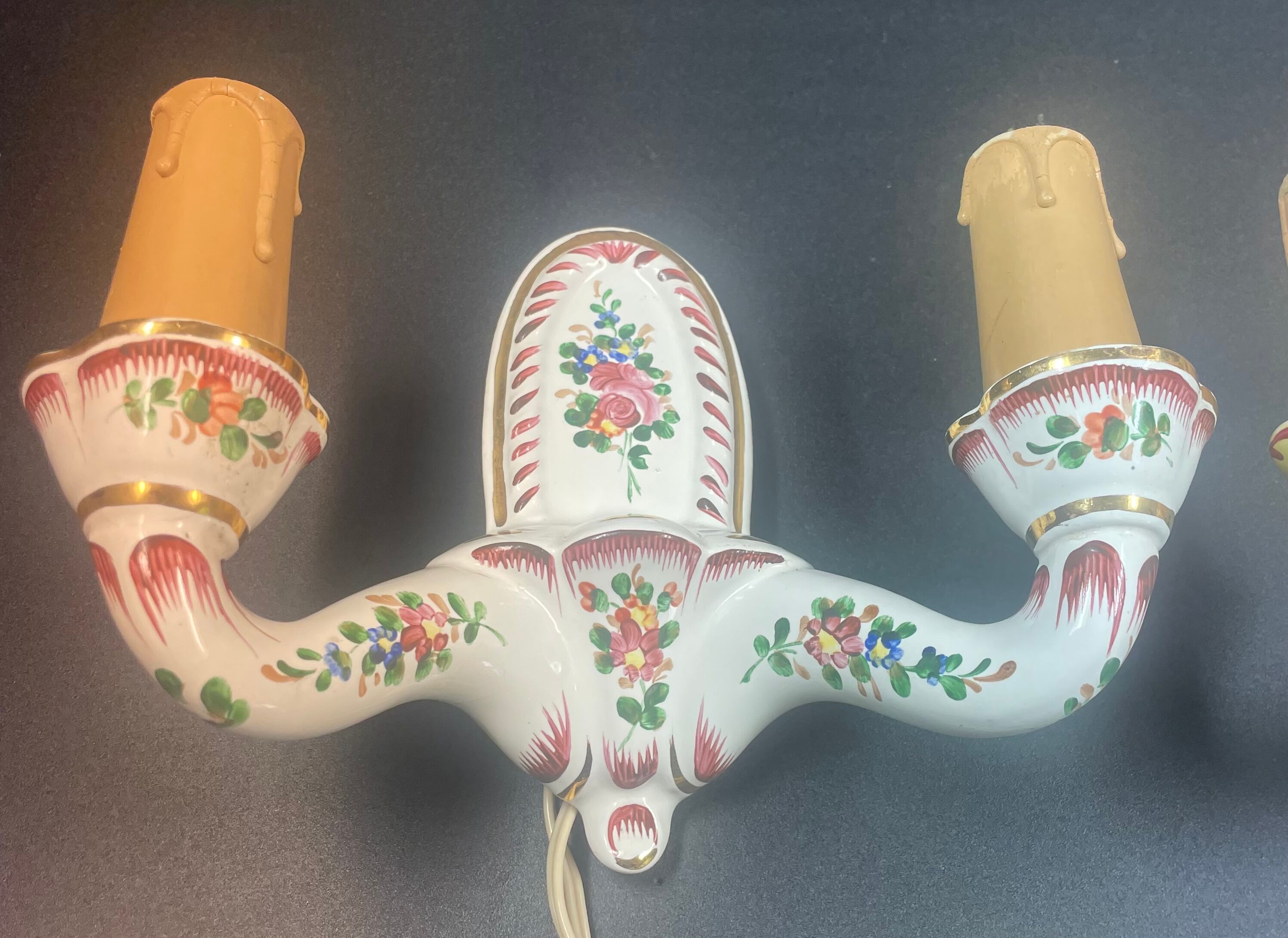 Pair of east sconces floral decor