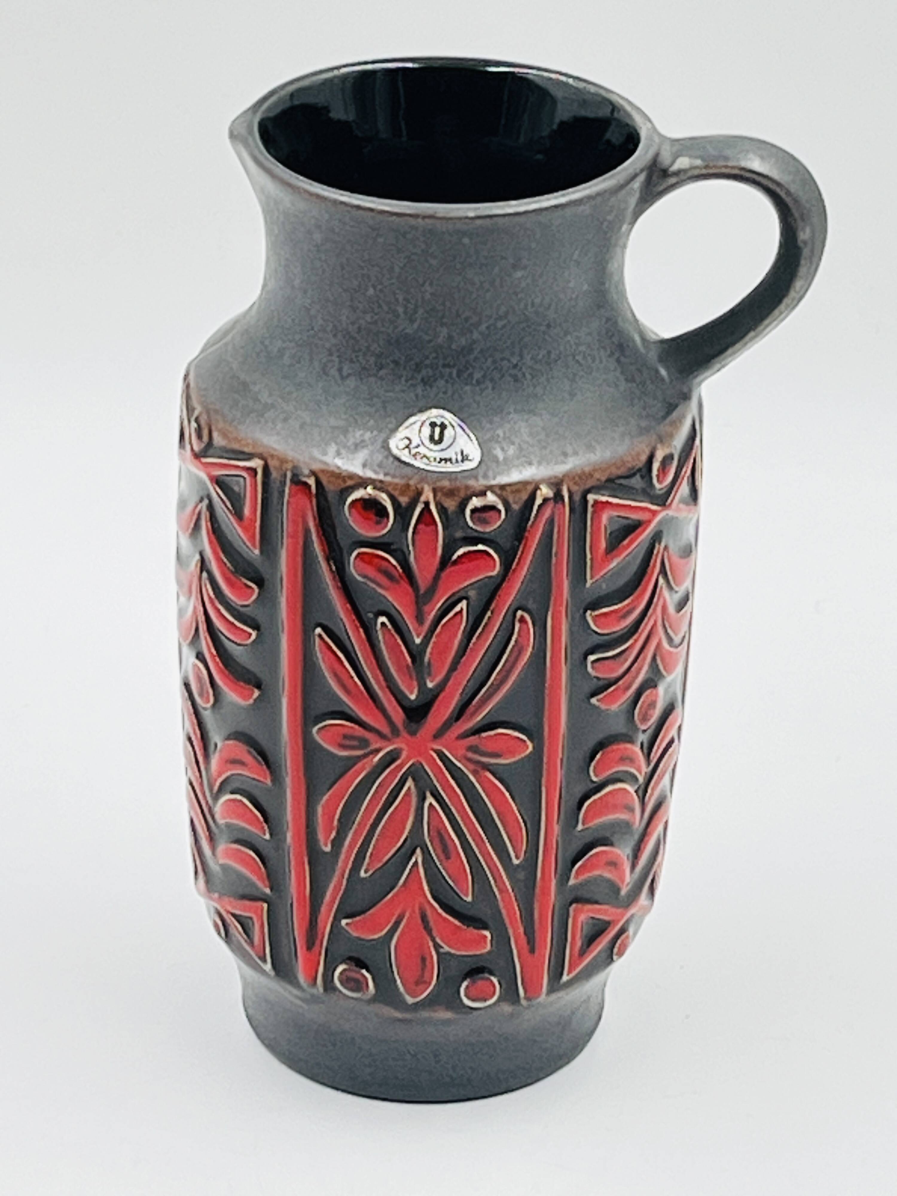 Vase West Germany, ceramic relief, red, 1970s.