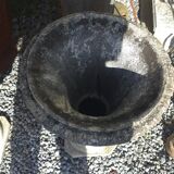 Medical vases with characters in reconstituted stone.