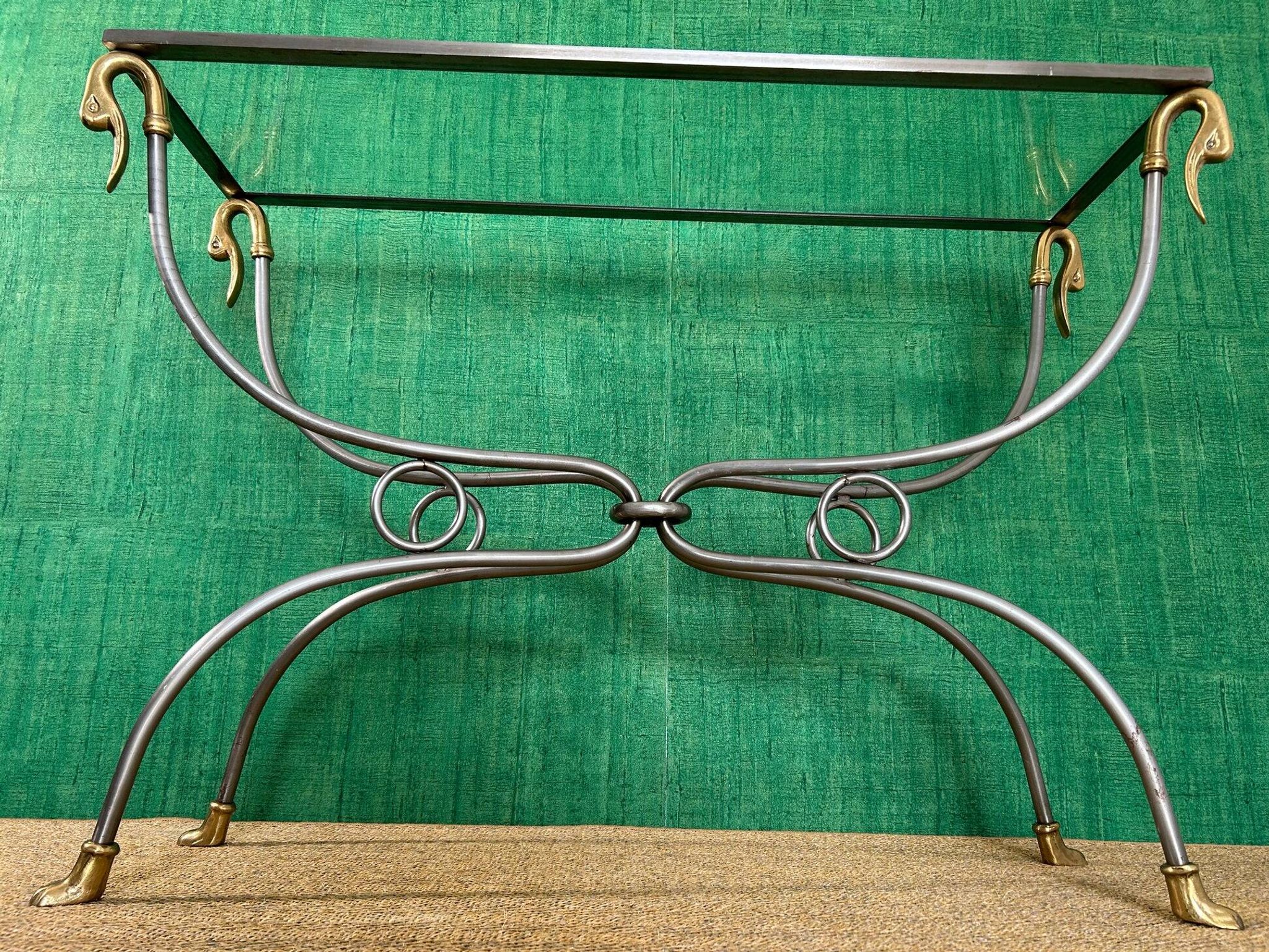 Polished steel and brass console, probably Maison Jansen, France, mid-century modern Hollywood Regency.