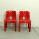 Ensemble de 2 chaises en plastique Universelle Red Joe Colombo de Kartell, Italie, 1967
