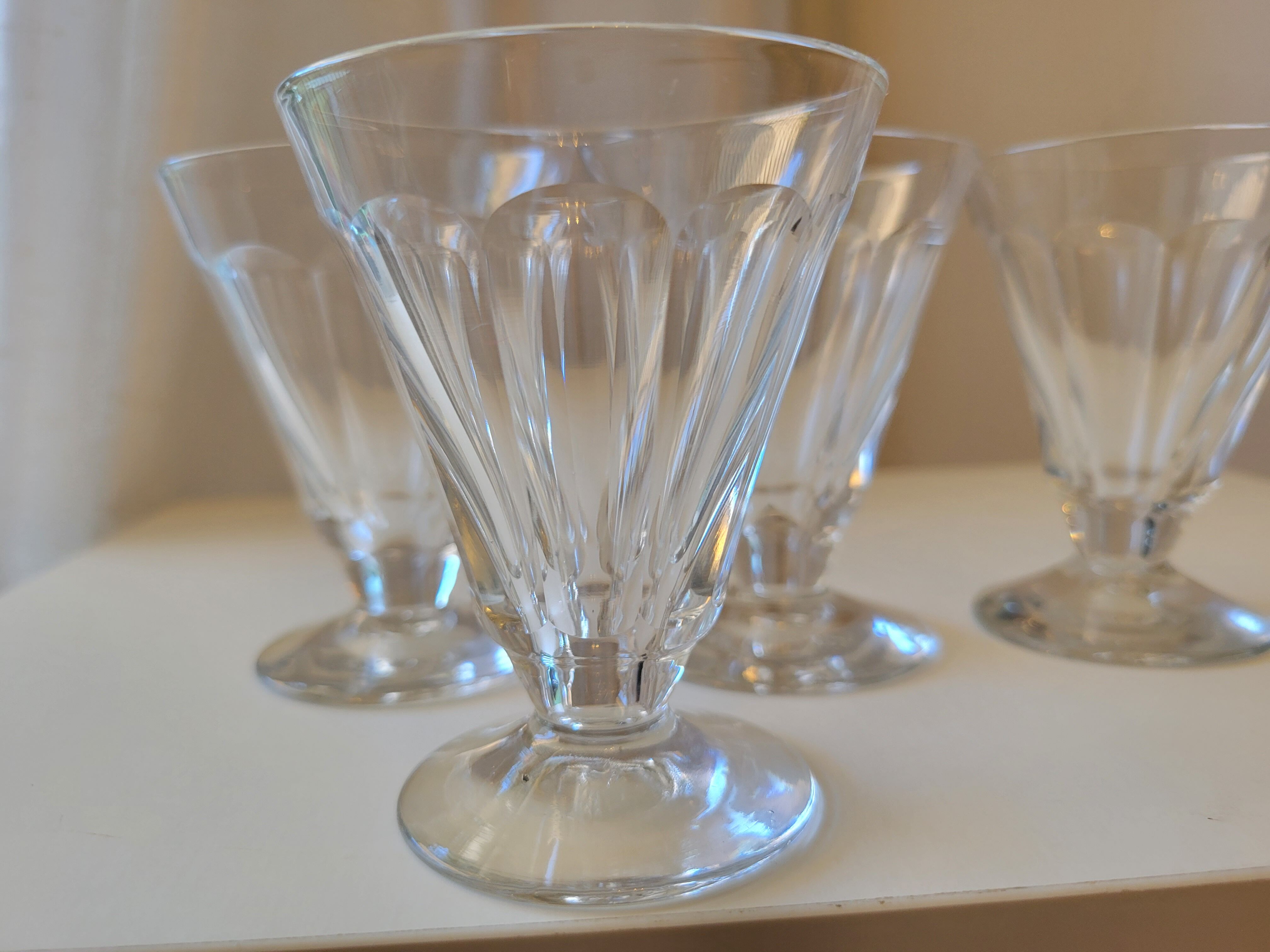 4 old conical liquor glasses cut with 10 flat ribs with faceted sides