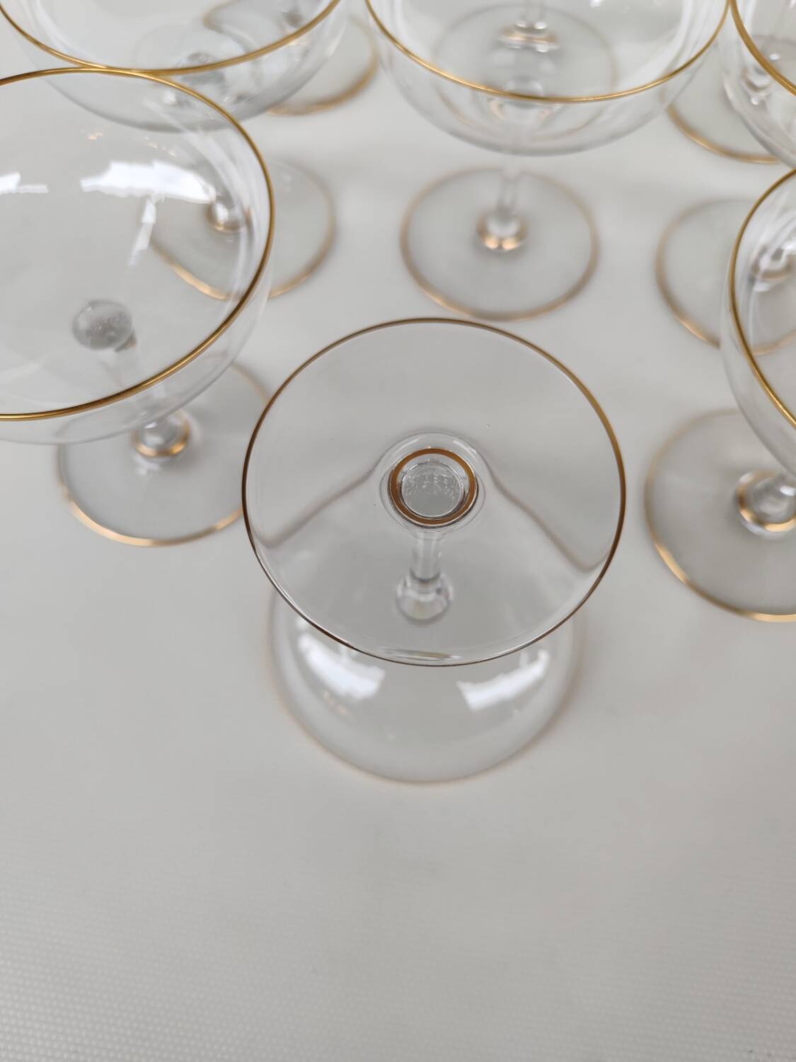 12 Baccarat crystal champagne coupes, circa 1900.