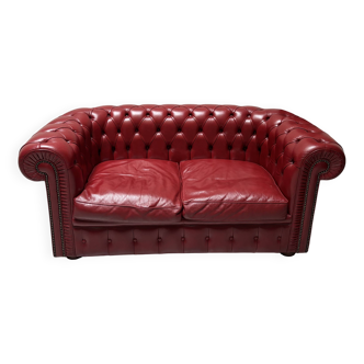Red leather chesterfield armchair