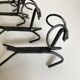 Set of 12 raw iron knife rests 1970