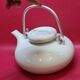 Large white porcelain teapot by Carl Gustaf Jahnsson