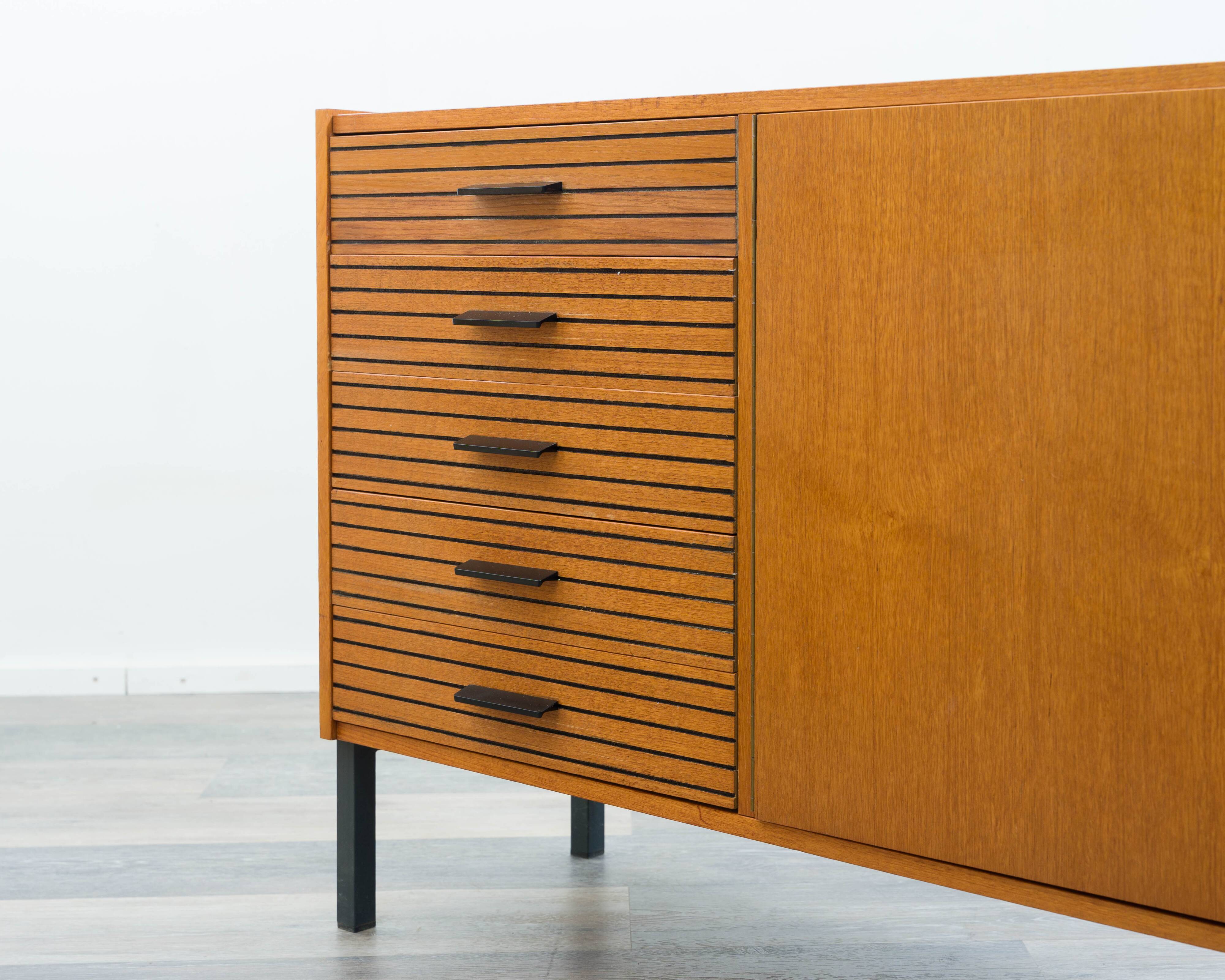 Teak sideboard with grooved drawers, 1960s.