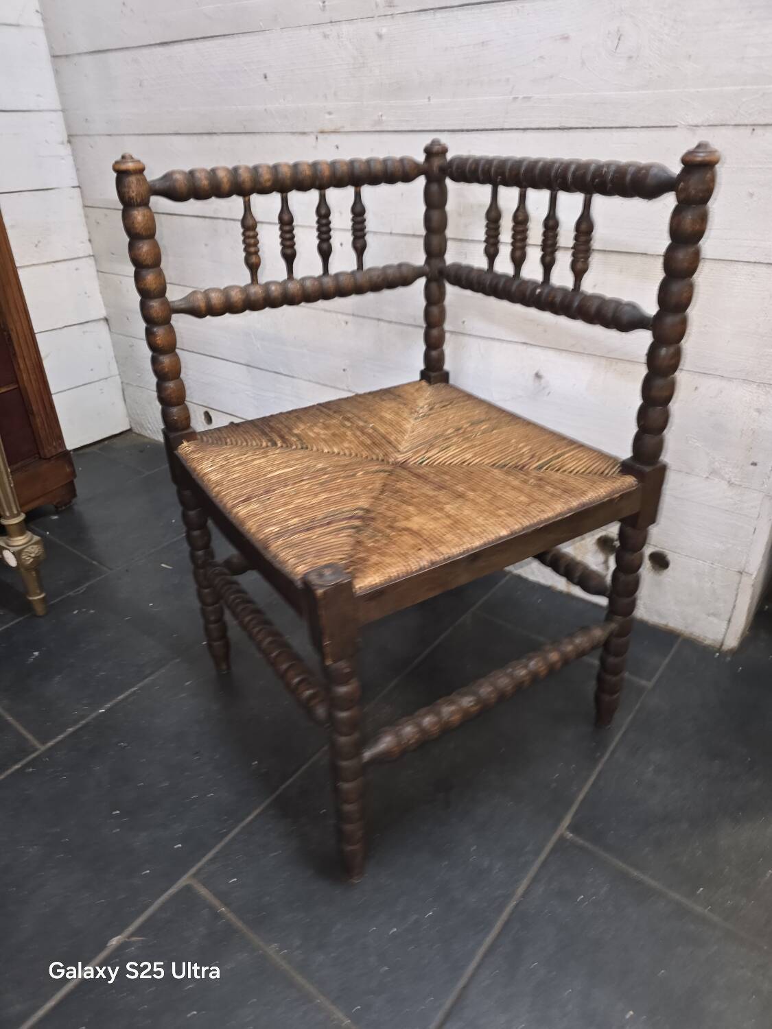 Antique corner fireplace armchair