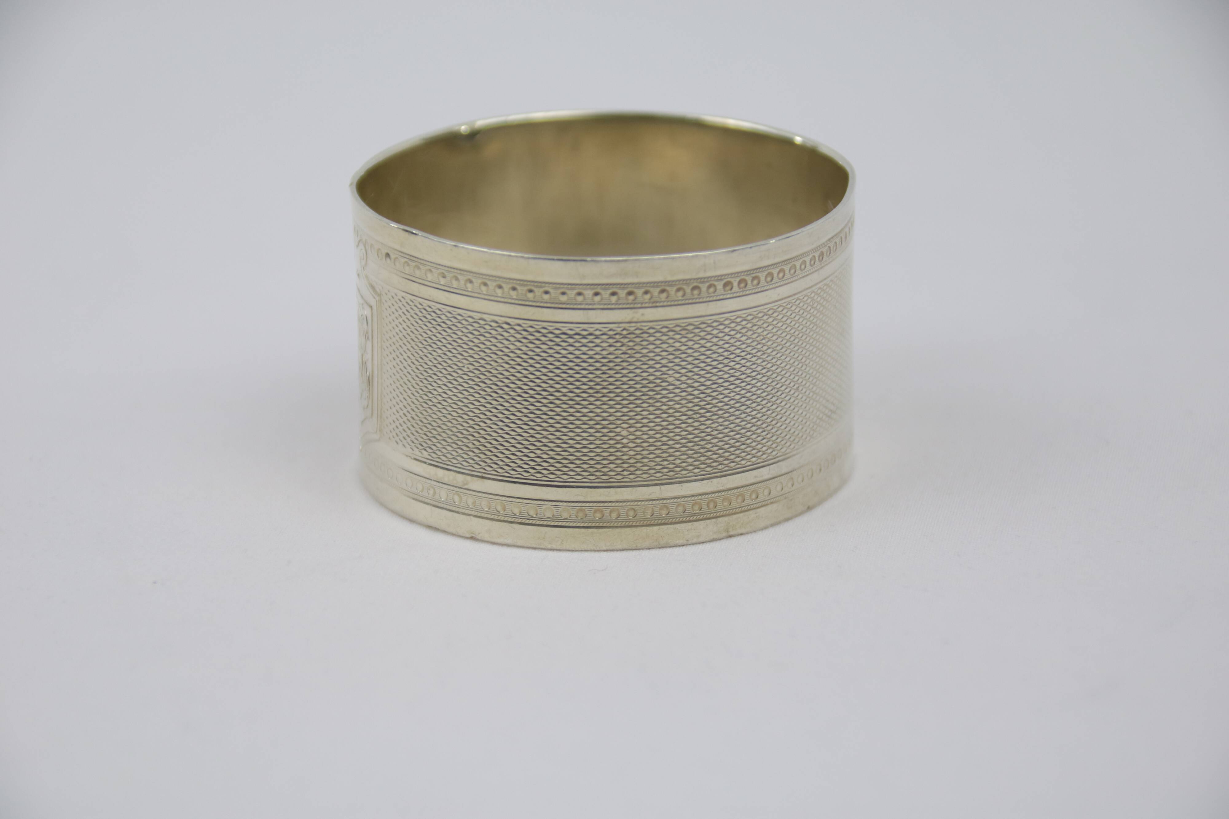 Dot towel ring and solid silver guilloches