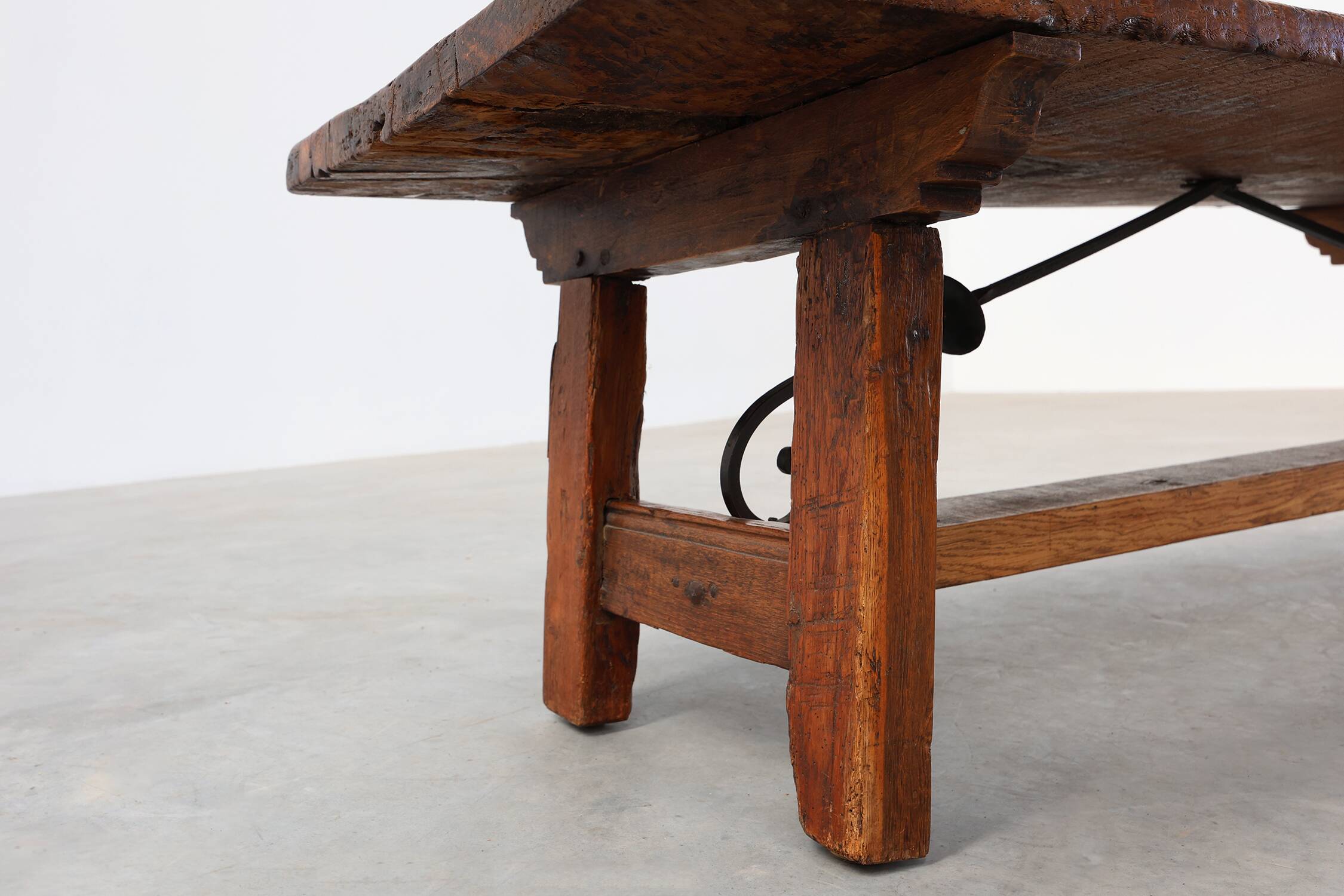 17th Century Spanish Brutalist coffee table in wood and wrought iron