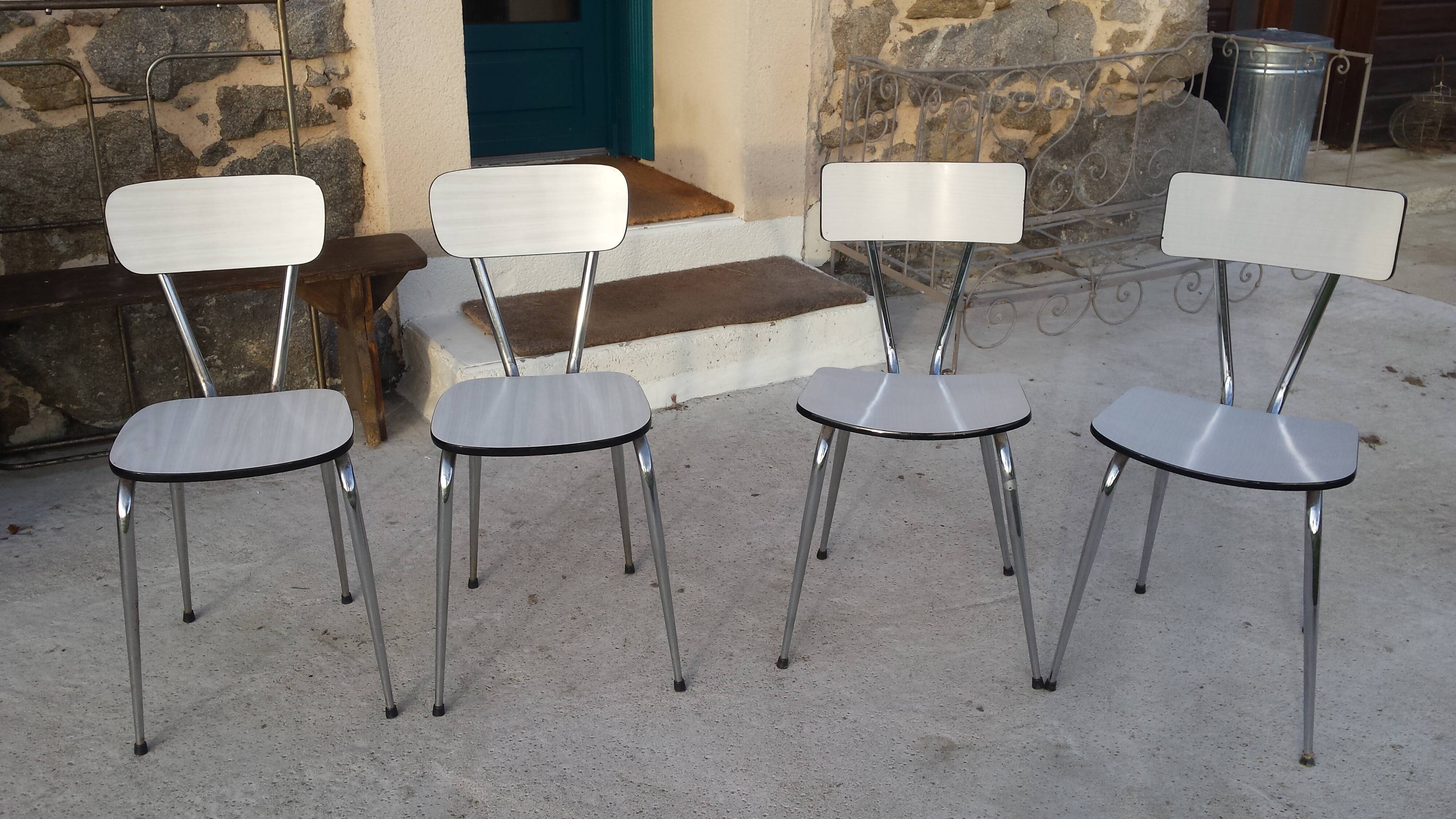 Table and 4 chairs in white formica