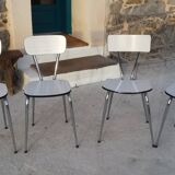 Table and 4 chairs in white formica