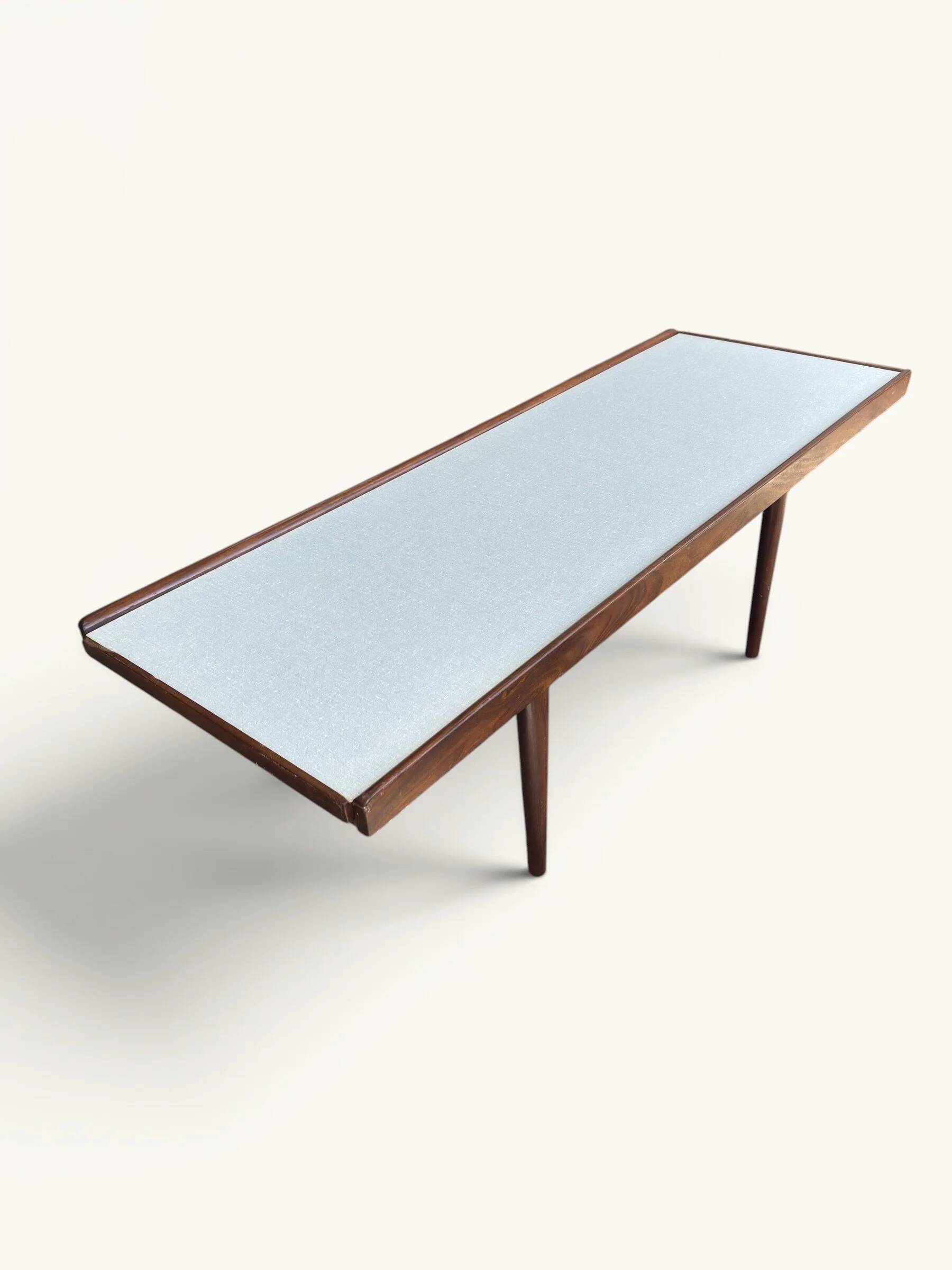 Vintage teak coffee table with a reversible top.