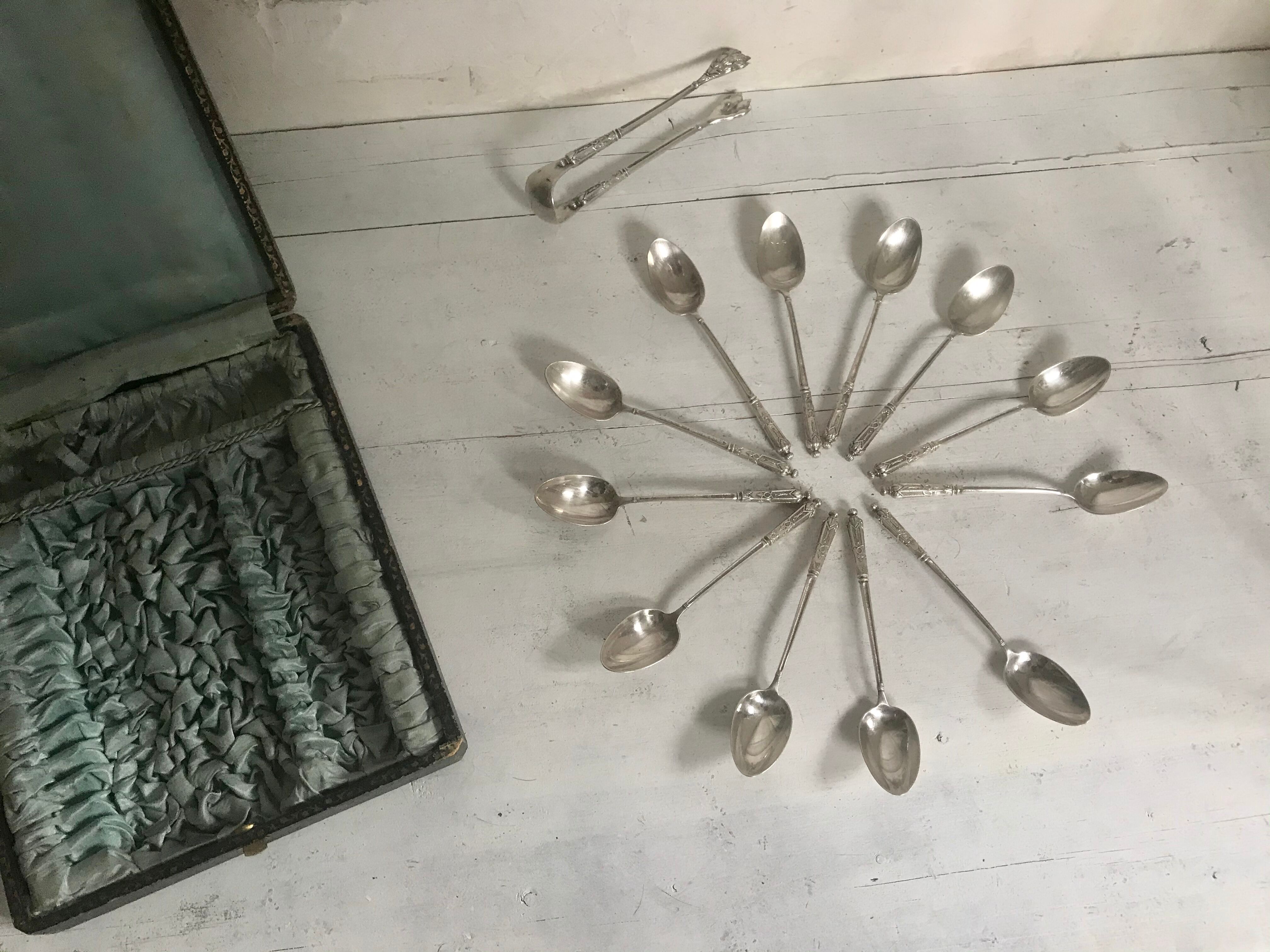 12 teaspoons silver metal