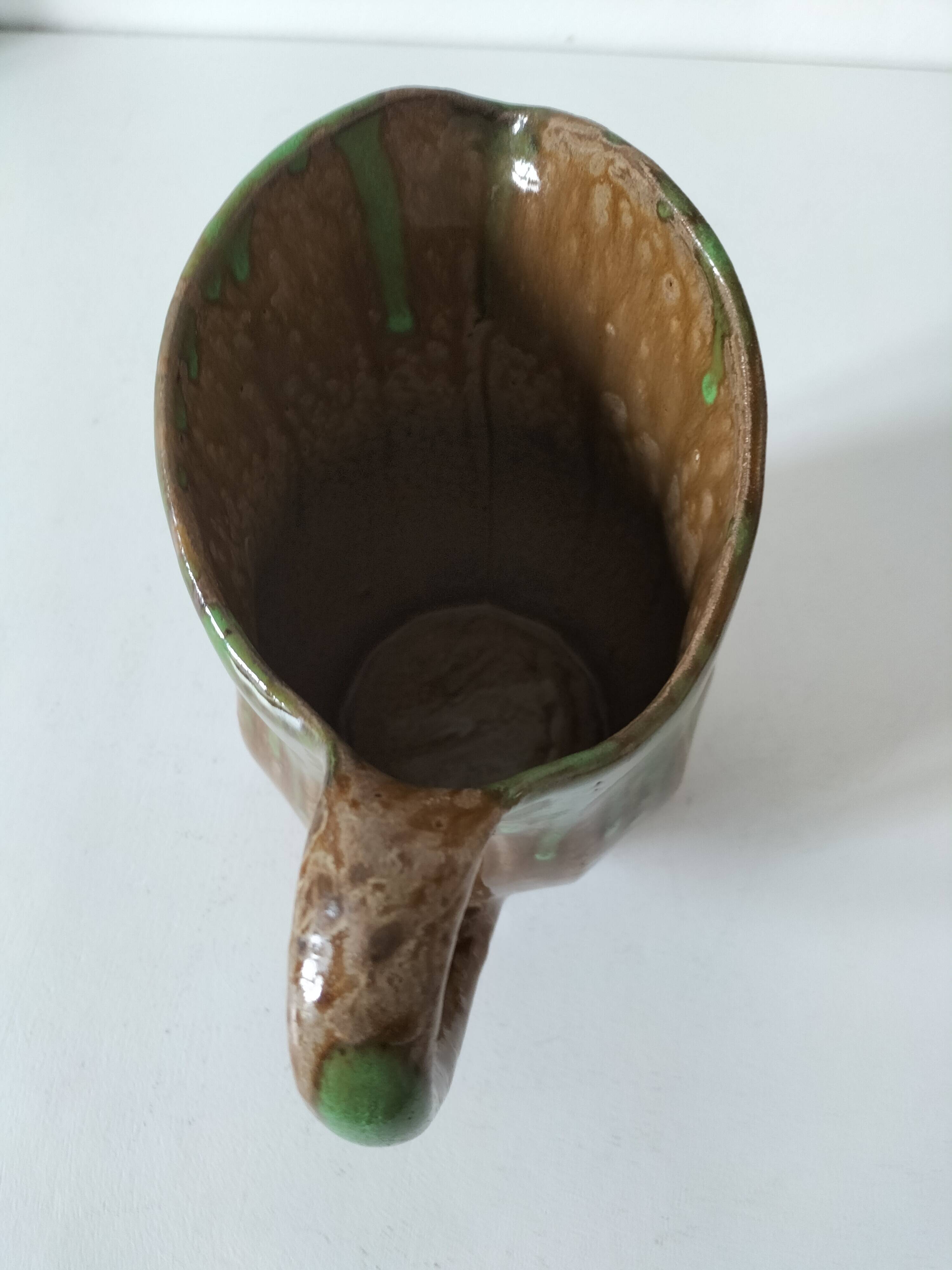 Handcrafted green and brown glazed ceramic pitcher, 1960s-70s