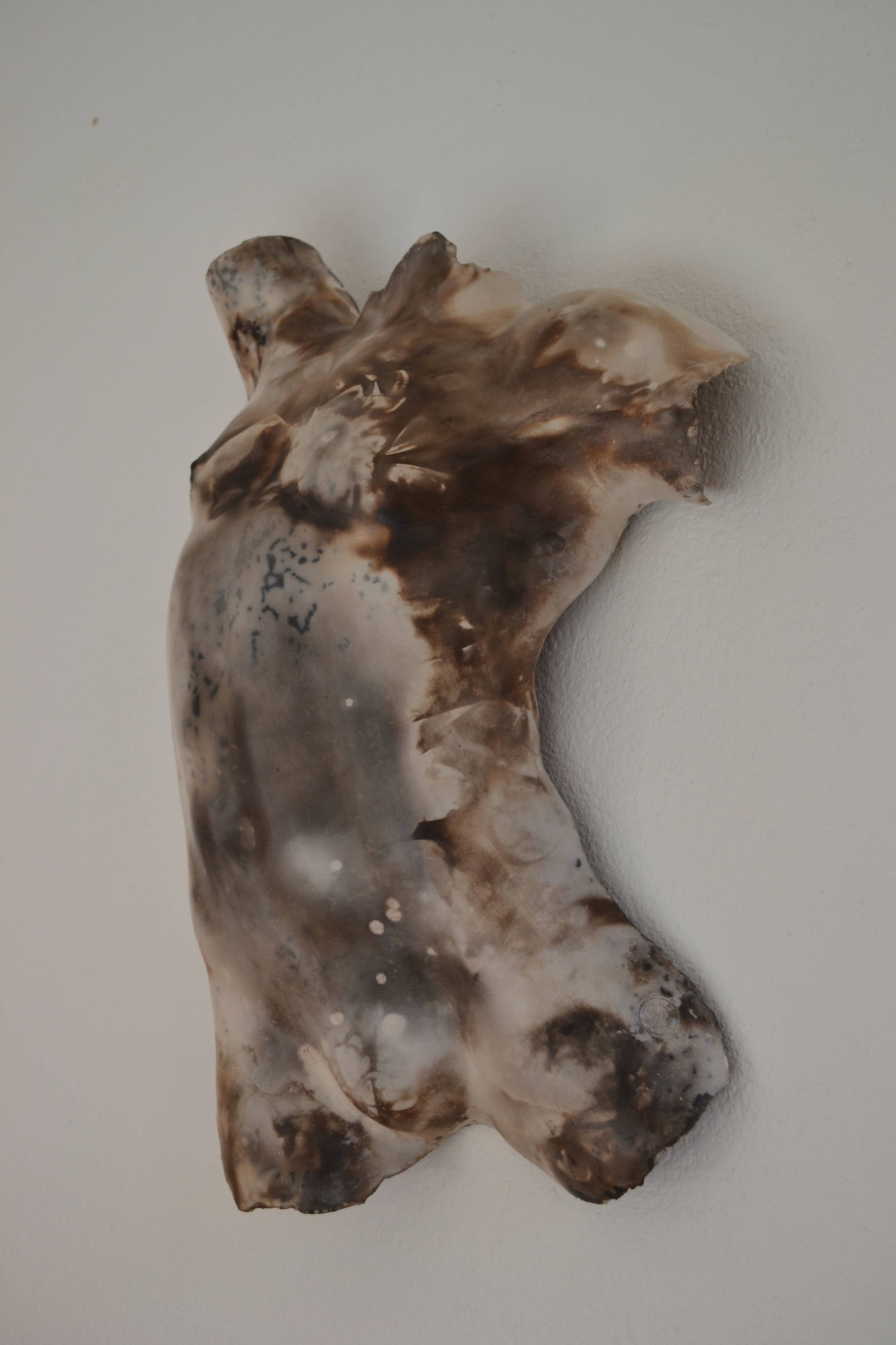 Male torso sculpture by patinated casting, signed to be identified.